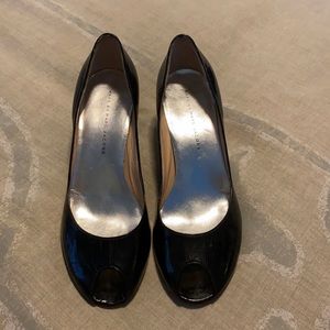 Marc Jacobs peep toe black patent leather pumps.